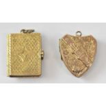 A yellow metal heart shaped locket pendant with belt decoration, 2.2 x 1.7cm, and a yellow metal