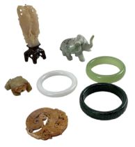 A group of Chinese carved hardstone items including a carved hardstone model of a toad, length