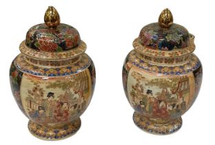 A pair of modern Chinese porcelain lidded temple jars, height 31cm.