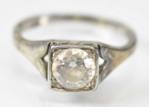 An 18ct yellow gold single stone ring set with large white stone, size I, approx 2.7g.