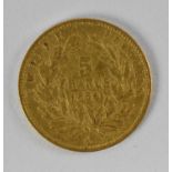 An 1854 French five francs gold coin, diameter 1.5cm, approx 1.5g.