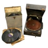 A Columbia leather cased travelling gramophone and a small quantity of classical records.