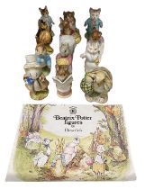 BESWICK; a group of twelve Beatrix Potter figures, with the collector's booklet, including 'Mr