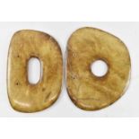 Two Chinese hardstone bi discs, 23.5cm and 23cm.