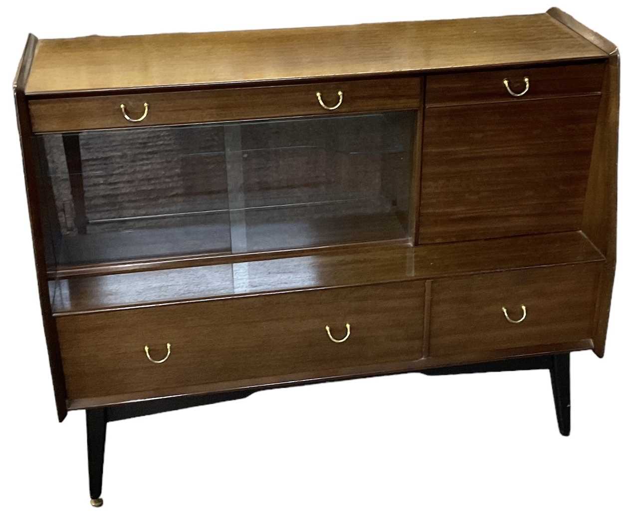 G PLAN; a mid century sideboard with two drawers above pair of sliding glass doors and two further