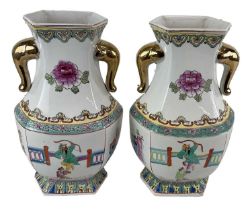 A pair of modern Chinese Famille Rose porcelain twin handled vases, marks to base, height 37cm.