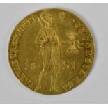 A Dutch one dukat gold coin, 1831, diameter 2cm, approx 3.5g.