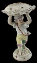 MEISSEN; a figural porcelain hand painted salt cellar, height 20cm.