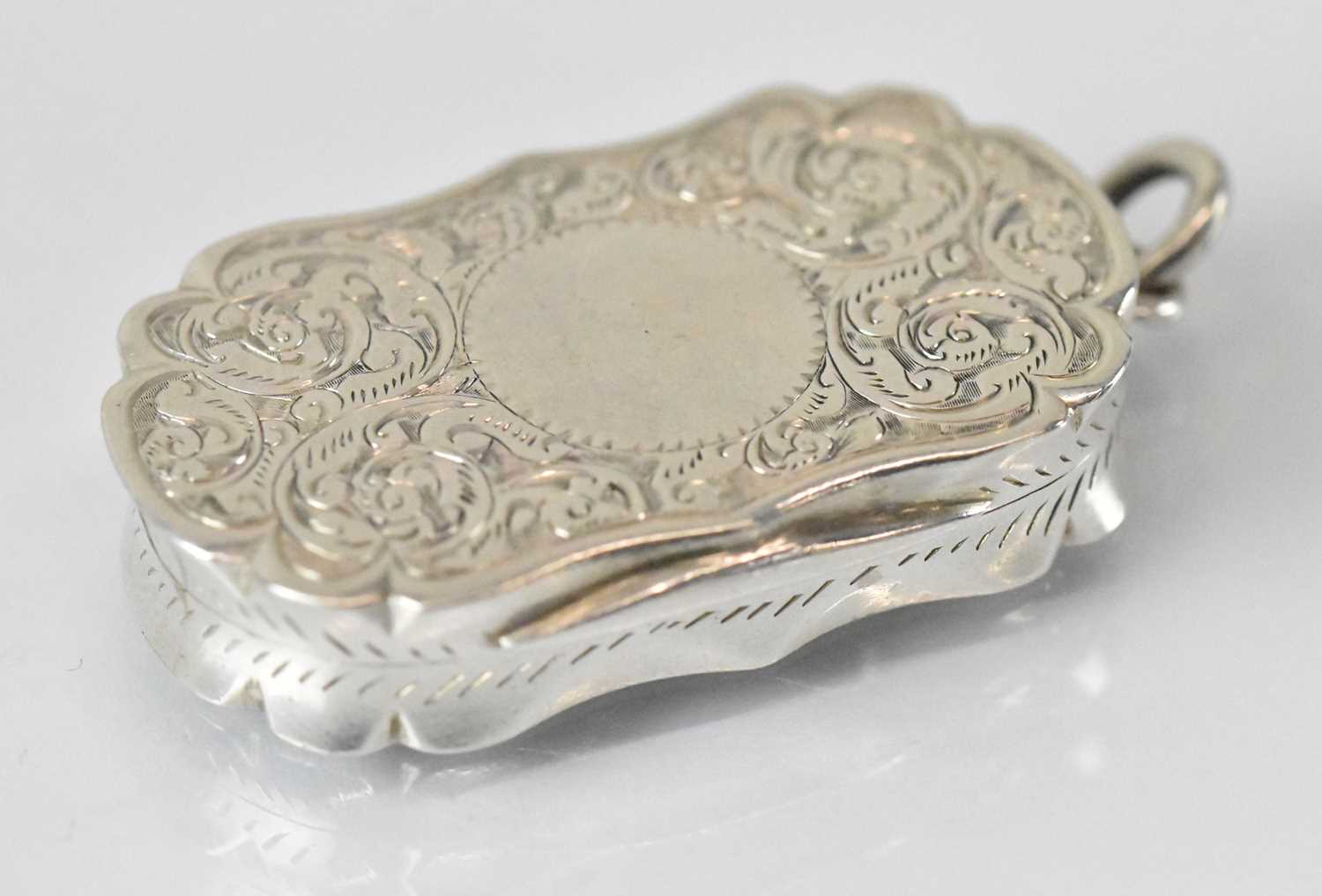 COLEN HEWER CHESHIRE; a Victorian hallmarked silver vinaigrette with pierced gilt interior,