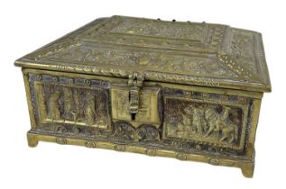 A late 19th century brass casket with figural decoration to the top, 18 x 16cm.