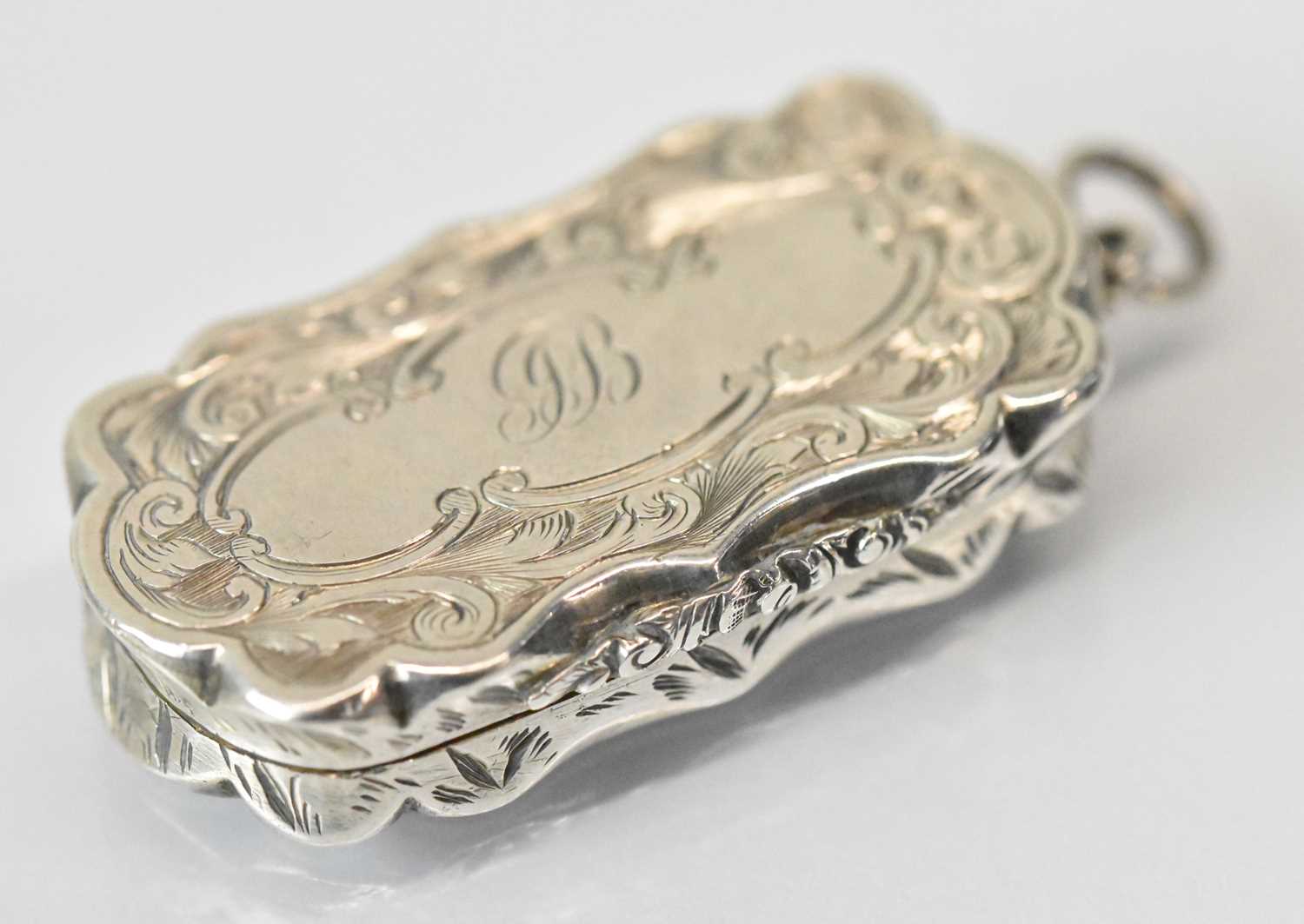 ALFRED TAYLOR; a Victorian hallmarked silver vinaigrette with pierced gilt interior, Birmingham