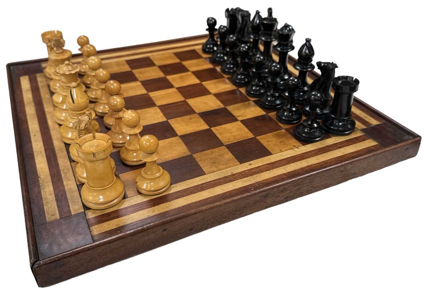 A cased Staunton chess set, another cased chess set, a games box and a chessboard, 39 x 39cm. - Image 2 of 2