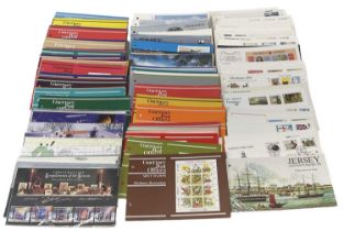 A quantity of GB and Channel Islands presentation packs and covers.