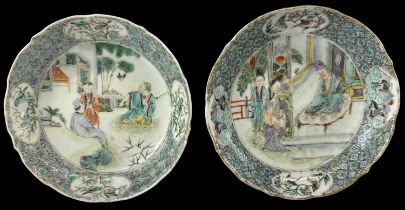 A pair of 19th century Chinese Famille Verte dishes decorated with figures and birds, diameter