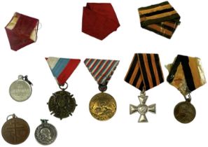 A group of seven Russian medals.