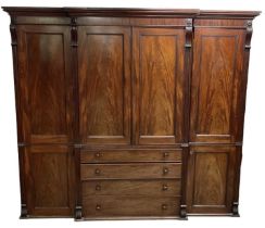 A large good quality 19th century mahogany breakfront wardrobe, with pair of doors above four long