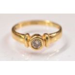 An 18ct yellow gold diamond solitaire ring, the central stone approx 0.25ct, size K/L, approx 2.7g.