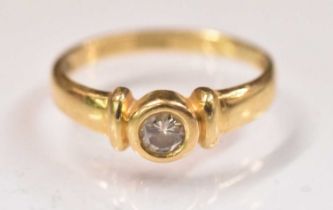 An 18ct yellow gold diamond solitaire ring, the central stone approx 0.25ct, size K/L, approx 2.7g.