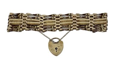 A 9ct yellow gold gate link bracelet, with padlock clasp, approx 14g.