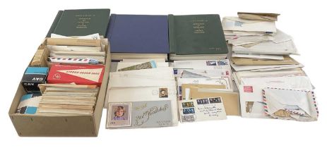 A group of all world stamps in three albums, loose and in boxes.