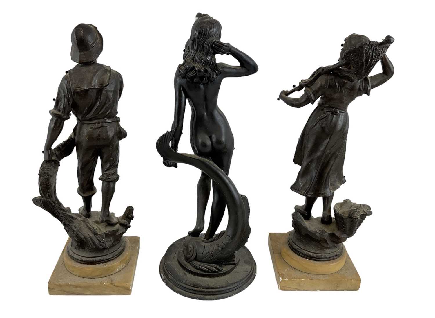 Two cast metal figures on hardstone bases, one depicting a sailor pulling a fish from the sea, the - Image 2 of 2