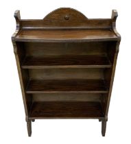 A 1920s oak three tier bookcase, height 112cm, width 73cm.