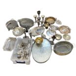 A large quantity of silver plated items including trays, flatware, vases, candlesticks, dishes etc
