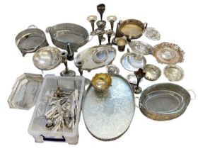 A large quantity of silver plated items including trays, flatware, vases, candlesticks, dishes etc