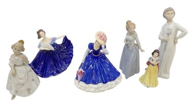 ROYAL DOULTON; a ceramic figure 'Mary' HN3375, 'Elaine' HN2791, and 'Snow White', also two Nao