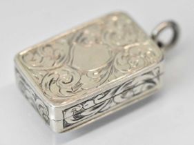 EDWARD SMITH; a small Victorian hallmarked silver vinaigrette, Birmingham 1844, 2.8 x 1.9cm,