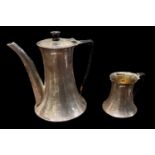 MAXFIELD & SONS LTD; an Edward VII hallmarked silver coffee pot with matching milk jug, both with