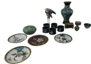 A group of Chinese cloisonné enamel items, including six napkin rings, miniature vase, cloisonné