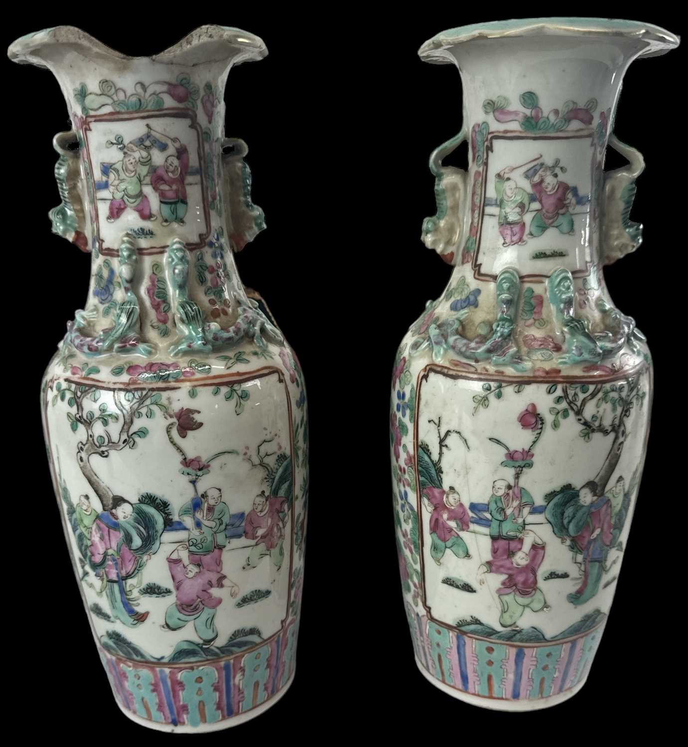 A pair of 19th century Chinese Canton Famille Rose porcelain hand painted vases decorated with