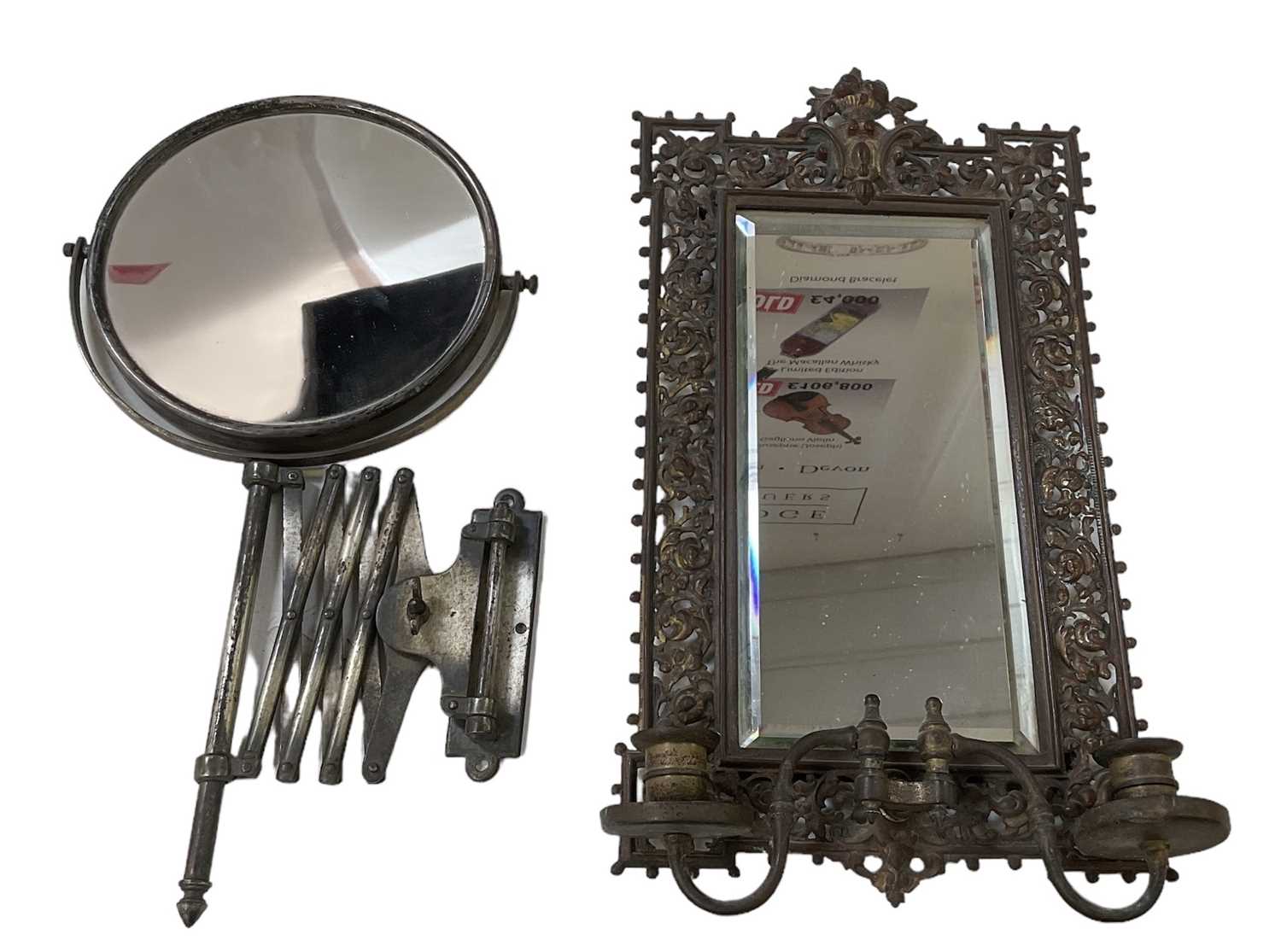 An elaborately gilt framed brass girandole wall mirror, height 38cm, width 22cm, and a 20th