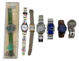 A group of gentleman's fashion wristwatches including Swatch, two Storm watches, a Junghans 'Mega