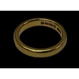 A 22ct yellow gold wedding band, size I, approx 5.8g.