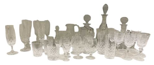 A large quantity of cut glassware including a ship's decanter, two further decanters, sherry