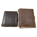 Two 19th century leather bound photograph albums.