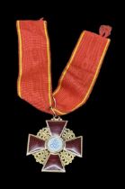 A gold and red enamelled Russian Order of St Anna Medal, the centre decorated with enamels depicting