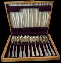 A set of six white metal tablespoons and another set of six white metal tablespoons, combined approx