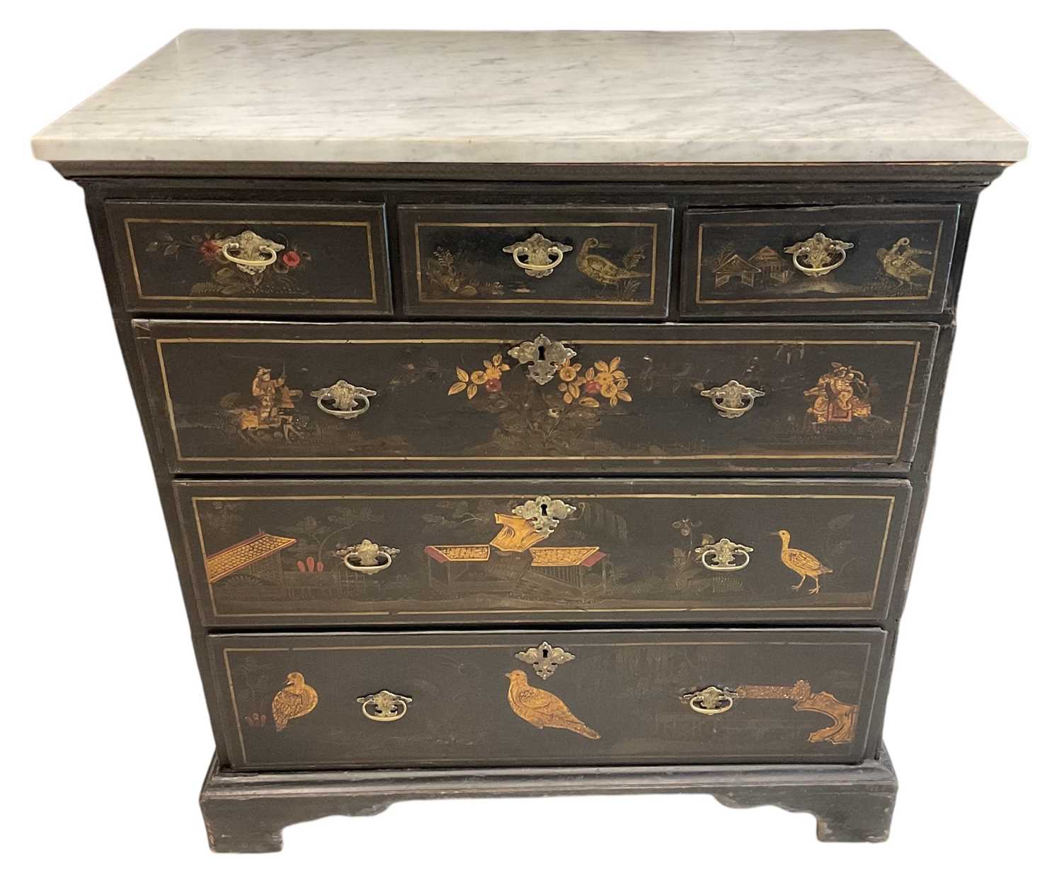 An 18th century black lacquered Chinoiserie decorated chest of three short over three long