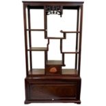 A Chinese rosewood miniature display stand, with Hickmet Pavilion Fine Art Gallery's label to the