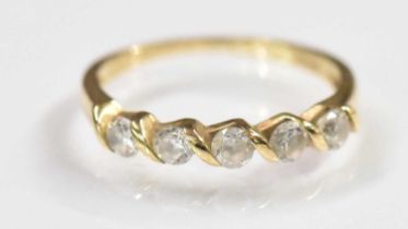 A 9ct yellow gold cubic zirconia set dress ring, set with five small cubic zirconias, size M/N,