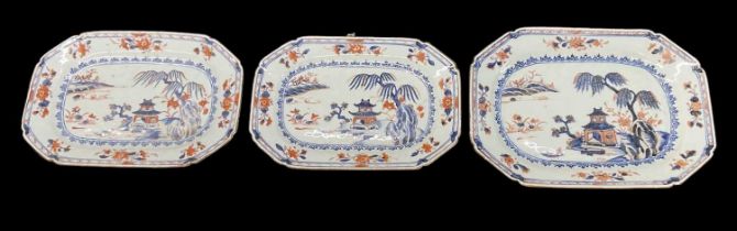 A graduated set of three Japanese Imari decorated platters, the largest measuring 31 x 22.5cm.