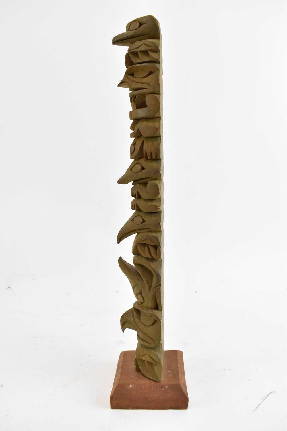 RAYMOND WILLIAMS; a carved wooden totem pole, signed to the base, height 31.5cm. - Image 3 of 3