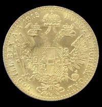 An Austro-Hungarian one ducat gold coin, bearing the head on Franz Joseph to the reverse, 1915,