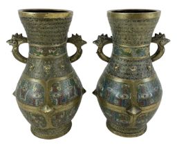 A pair of early 20th century Chinese brass cloisonné enamel twin handled vases, four character marks
