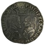 A Philip & Mary 1554 silver shilling.