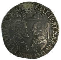 A Philip & Mary 1554 silver shilling.
