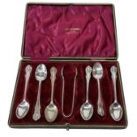 WALKER & HALL LTD; a set of six Edward VII hallmarked silver teaspoons and matching sugar tongs,